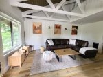 Seasons 4 200- Living Room with a Leather Couch and Vaulted Ceilings